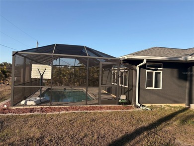 This Stunning 3 bed/2 bath Pool home in Harbour Heights is on Deep Creek Golf Club in Florida - for sale on GolfHomes.com, golf home, golf lot