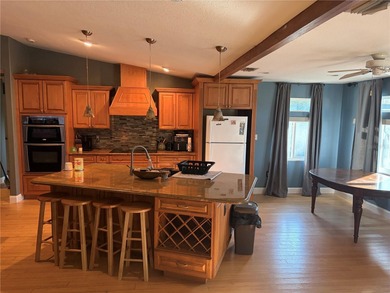 This Stunning 3 bed/2 bath Pool home in Harbour Heights is on Deep Creek Golf Club in Florida - for sale on GolfHomes.com, golf home, golf lot