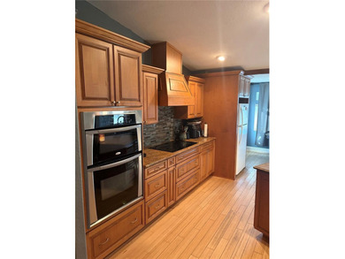 This Stunning 3 bed/2 bath Pool home in Harbour Heights is on Deep Creek Golf Club in Florida - for sale on GolfHomes.com, golf home, golf lot