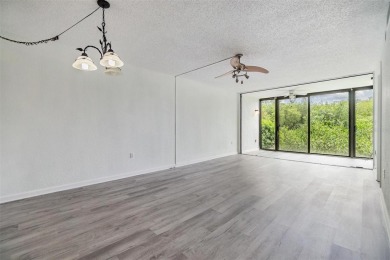 Welcome to this beautifully updated 2-bedroom, 2-bath condo in on Cove Cay Country Club in Florida - for sale on GolfHomes.com, golf home, golf lot