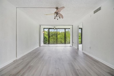 Welcome to this beautifully updated 2-bedroom, 2-bath condo in on Cove Cay Country Club in Florida - for sale on GolfHomes.com, golf home, golf lot