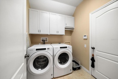 Welcome home to this beautifully cared-for 3-bedroom, 2.5-bath on Largo Golf Course in Florida - for sale on GolfHomes.com, golf home, golf lot