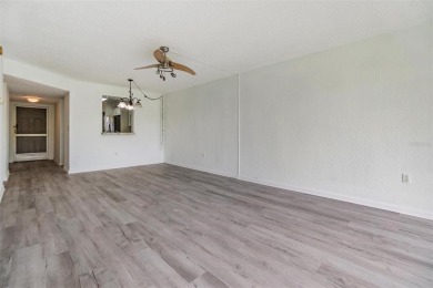 Welcome to this beautifully updated 2-bedroom, 2-bath condo in on Cove Cay Country Club in Florida - for sale on GolfHomes.com, golf home, golf lot