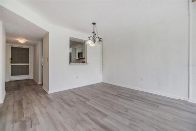 Welcome to this beautifully updated 2-bedroom, 2-bath condo in on Cove Cay Country Club in Florida - for sale on GolfHomes.com, golf home, golf lot