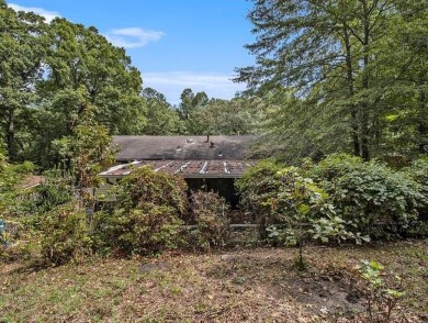 Great opportunity! Fixer-upper is just a stone's throw from on Browns Mill Golf Course in Georgia - for sale on GolfHomes.com, golf home, golf lot