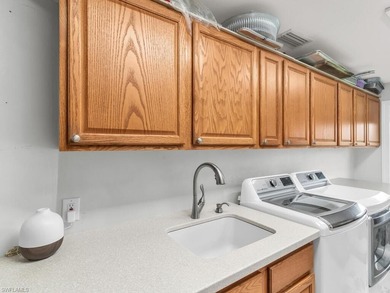 Stunning 4-Bed, 3-Bath Home on Nearly Half an Acre at Island on Island Country Club in Florida - for sale on GolfHomes.com, golf home, golf lot