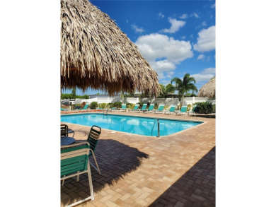 Welcome to this beautifully updated 2-bedroom, 2-bath condo in on Cove Cay Country Club in Florida - for sale on GolfHomes.com, golf home, golf lot