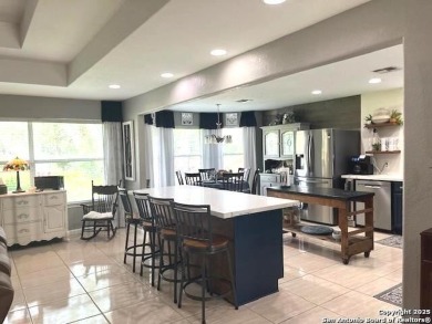 Beautifully maintained immaculate home located on the third hole on Devine Golf Course in Texas - for sale on GolfHomes.com, golf home, golf lot