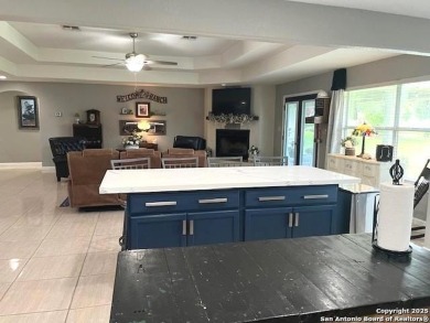 Beautifully maintained immaculate home located on the third hole on Devine Golf Course in Texas - for sale on GolfHomes.com, golf home, golf lot