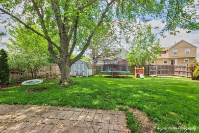Welcome to this beautifully updated 4-bedroom, 2.5-bath home on Renwood Golf Course in Illinois - for sale on GolfHomes.com, golf home, golf lot