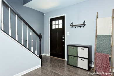 Welcome to this beautifully updated 4-bedroom, 2.5-bath home on Renwood Golf Course in Illinois - for sale on GolfHomes.com, golf home, golf lot