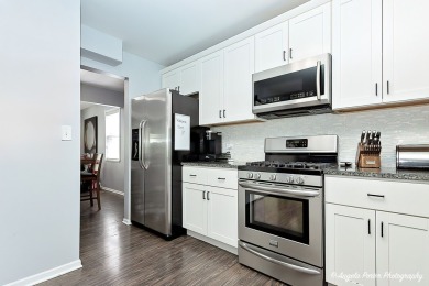 Welcome to this beautifully updated 4-bedroom, 2.5-bath home on Renwood Golf Course in Illinois - for sale on GolfHomes.com, golf home, golf lot