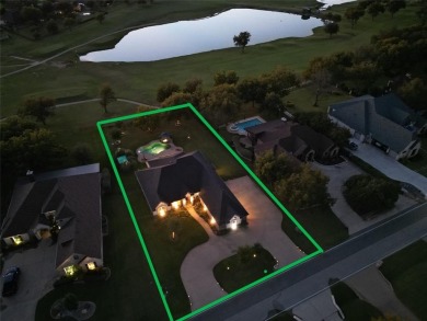Luxury living on the golf course! Nestled along the 14th hole of on Pecan Plantation Country Club in Texas - for sale on GolfHomes.com, golf home, golf lot