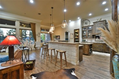 Luxury living on the golf course! Nestled along the 14th hole of on Pecan Plantation Country Club in Texas - for sale on GolfHomes.com, golf home, golf lot