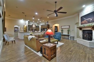 Luxury living on the golf course! Nestled along the 14th hole of on Pecan Plantation Country Club in Texas - for sale on GolfHomes.com, golf home, golf lot