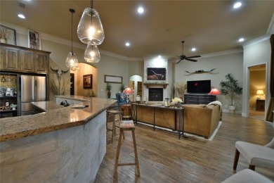 Luxury living on the golf course! Nestled along the 14th hole of on Pecan Plantation Country Club in Texas - for sale on GolfHomes.com, golf home, golf lot