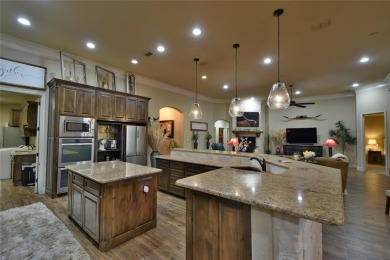 Luxury living on the golf course! Nestled along the 14th hole of on Pecan Plantation Country Club in Texas - for sale on GolfHomes.com, golf home, golf lot