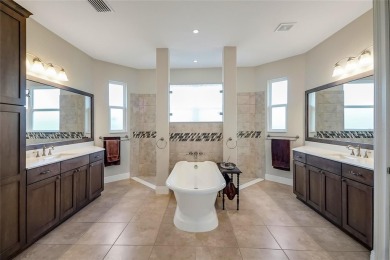 Experience luxury living in this impeccably upgraded 4 bed + on Harbor Hills Country Club in Florida - for sale on GolfHomes.com, golf home, golf lot