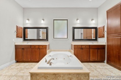 Luxury living awaits in The Dominion! This elegant corner-lot 3 on The Dominion Country Club in Texas - for sale on GolfHomes.com, golf home, golf lot