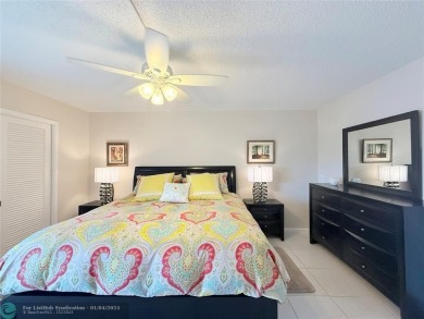 This elegant 2-bedroom 2-bathroom condo features a SPACIOUS on Hillsboro Pines Golf in Florida - for sale on GolfHomes.com, golf home, golf lot