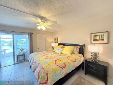 This elegant 2-bedroom 2-bathroom condo features a SPACIOUS on Hillsboro Pines Golf in Florida - for sale on GolfHomes.com, golf home, golf lot