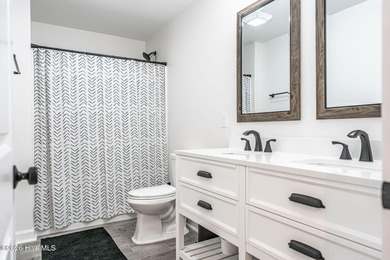 Golf course front living at its finest, perfectly positioned on on Deercroft Golf and Country Club in North Carolina - for sale on GolfHomes.com, golf home, golf lot