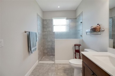 Experience luxury living in this impeccably upgraded 4 bed + on Harbor Hills Country Club in Florida - for sale on GolfHomes.com, golf home, golf lot