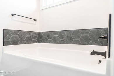 Golf course front living at its finest, perfectly positioned on on Deercroft Golf and Country Club in North Carolina - for sale on GolfHomes.com, golf home, golf lot