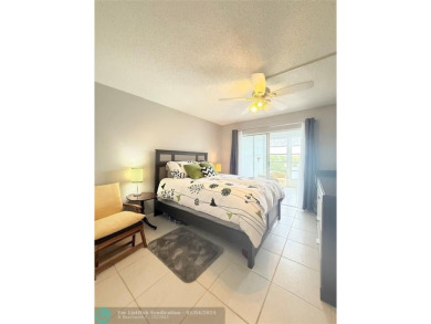 This elegant 2-bedroom 2-bathroom condo features a SPACIOUS on Hillsboro Pines Golf in Florida - for sale on GolfHomes.com, golf home, golf lot