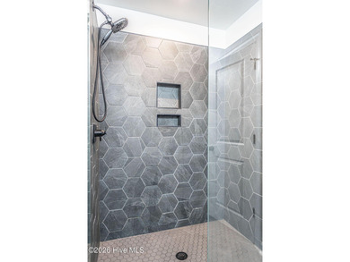 Golf course front living at its finest, perfectly positioned on on Deercroft Golf and Country Club in North Carolina - for sale on GolfHomes.com, golf home, golf lot