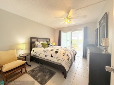 This elegant 2-bedroom 2-bathroom condo features a SPACIOUS on Hillsboro Pines Golf in Florida - for sale on GolfHomes.com, golf home, golf lot