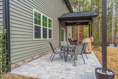 Golf course front living at its finest, perfectly positioned on on Deercroft Golf and Country Club in North Carolina - for sale on GolfHomes.com, golf home, golf lot