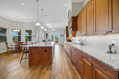 Experience luxury living in this impeccably upgraded 4 bed + on Harbor Hills Country Club in Florida - for sale on GolfHomes.com, golf home, golf lot