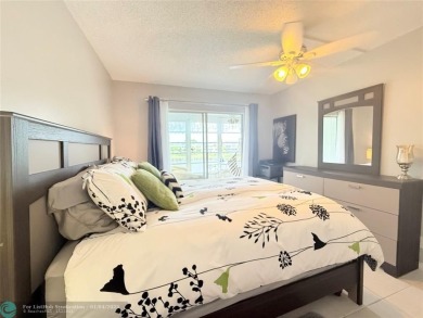 This elegant 2-bedroom 2-bathroom condo features a SPACIOUS on Hillsboro Pines Golf in Florida - for sale on GolfHomes.com, golf home, golf lot