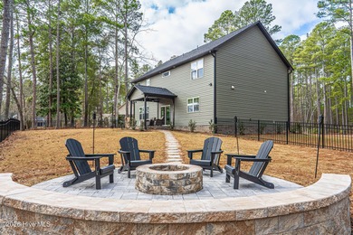 Golf course front living at its finest, perfectly positioned on on Deercroft Golf and Country Club in North Carolina - for sale on GolfHomes.com, golf home, golf lot