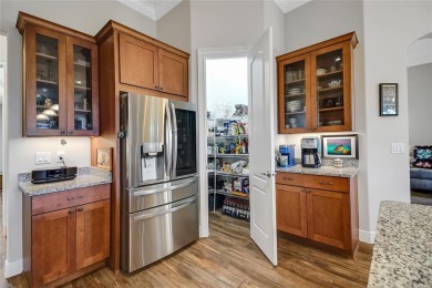 Experience luxury living in this impeccably upgraded 4 bed + on Harbor Hills Country Club in Florida - for sale on GolfHomes.com, golf home, golf lot