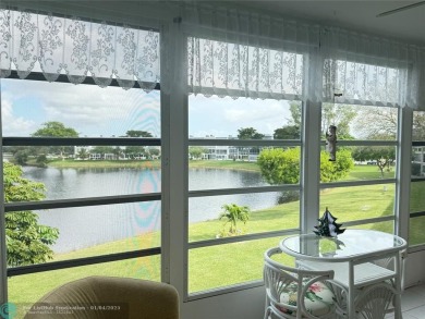 This elegant 2-bedroom 2-bathroom condo features a SPACIOUS on Hillsboro Pines Golf in Florida - for sale on GolfHomes.com, golf home, golf lot