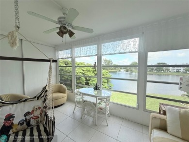 This elegant 2-bedroom 2-bathroom condo features a SPACIOUS on Hillsboro Pines Golf in Florida - for sale on GolfHomes.com, golf home, golf lot