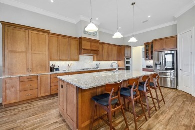 Experience luxury living in this impeccably upgraded 4 bed + on Harbor Hills Country Club in Florida - for sale on GolfHomes.com, golf home, golf lot