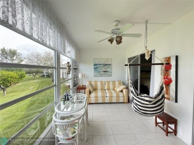 This elegant 2-bedroom 2-bathroom condo features a SPACIOUS on Hillsboro Pines Golf in Florida - for sale on GolfHomes.com, golf home, golf lot