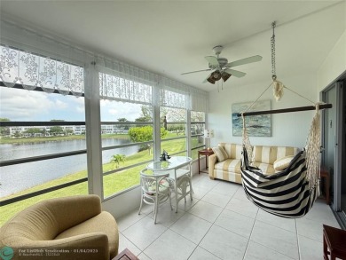 This elegant 2-bedroom 2-bathroom condo features a SPACIOUS on Hillsboro Pines Golf in Florida - for sale on GolfHomes.com, golf home, golf lot