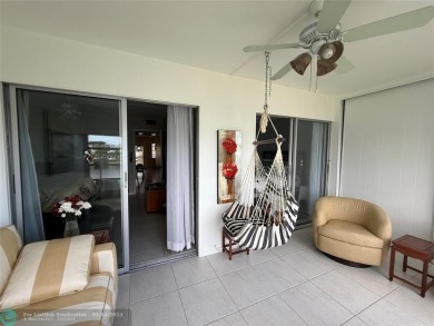 This elegant 2-bedroom 2-bathroom condo features a SPACIOUS on Hillsboro Pines Golf in Florida - for sale on GolfHomes.com, golf home, golf lot