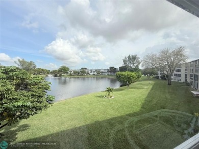 This elegant 2-bedroom 2-bathroom condo features a SPACIOUS on Hillsboro Pines Golf in Florida - for sale on GolfHomes.com, golf home, golf lot