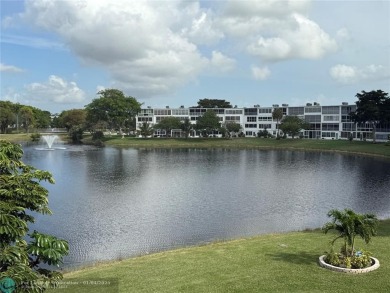 This elegant 2-bedroom 2-bathroom condo features a SPACIOUS on Hillsboro Pines Golf in Florida - for sale on GolfHomes.com, golf home, golf lot