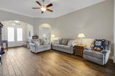 Experience luxury living in this impeccably upgraded 4 bed + on Harbor Hills Country Club in Florida - for sale on GolfHomes.com, golf home, golf lot