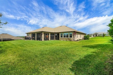 Experience luxury living in this impeccably upgraded 4 bed + on Harbor Hills Country Club in Florida - for sale on GolfHomes.com, golf home, golf lot