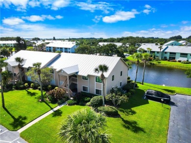 First floor unit with a lake view. 42* kitchen cabinets, granite on Pelican Pointe 9 Hole Course in Florida - for sale on GolfHomes.com, golf home, golf lot