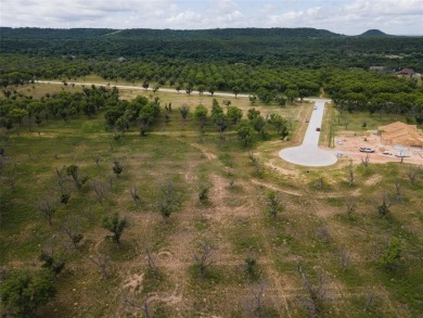 Discover the perfect blend of country living and community on Pecan Plantation Country Club in Texas - for sale on GolfHomes.com, golf home, golf lot