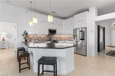 EXQUISITE TURNKEY GOLF-FRONT RESIDENCE IN WORTHINGTON COUNTRY on Worthington Country Club in Florida - for sale on GolfHomes.com, golf home, golf lot