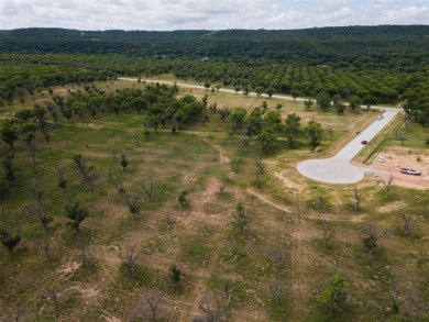 Discover the perfect blend of country living and community on Pecan Plantation Country Club in Texas - for sale on GolfHomes.com, golf home, golf lot